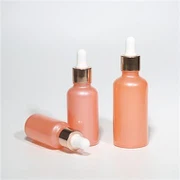 Rosa glassdråpeflasker